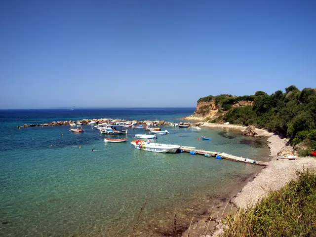 Porto Roma beach in Zakynthos, featuring a mixed shoreline with calm water conditions