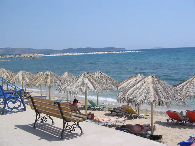 Limenaria beach in Thassos, featuring a sandy shoreline with moderate water conditions