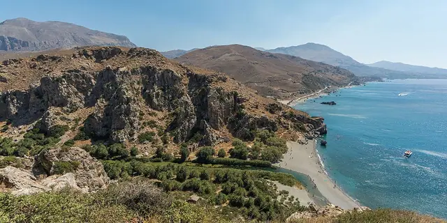 Preveli Beach in Crete, featuring a mixed shoreline with calm water conditions