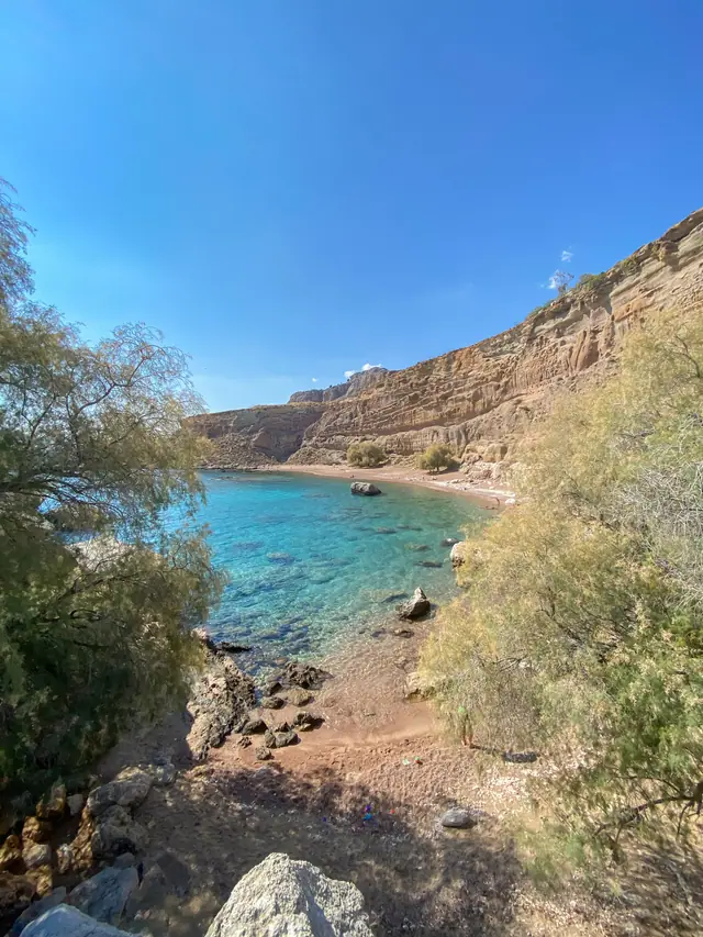 Kokkini Ammos Beach in Rhodes, featuring a mixed shoreline with moderate water conditions