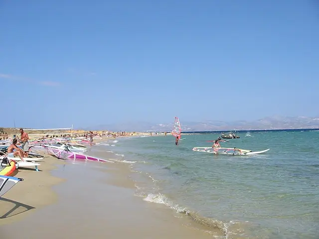 New Golden Beach in Paros, featuring a sandy shoreline with surfable water conditions
