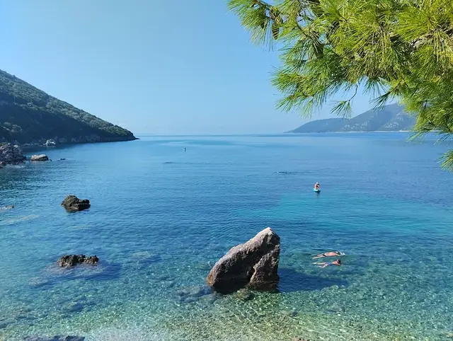 Vasiliki Beach in Lefkada, featuring a mixed shoreline with moderate water conditions