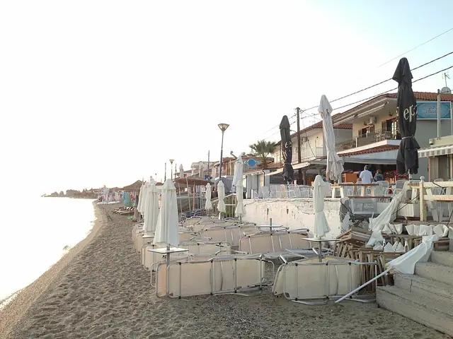 Polychrono Beach in Chalkidiki, featuring a sandy shoreline with calm water conditions, certified with Blue Flag status for environmental quality