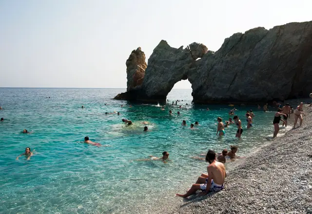 Mega Gyalos beach in Skiathos, featuring a mixed shoreline with moderate water conditions