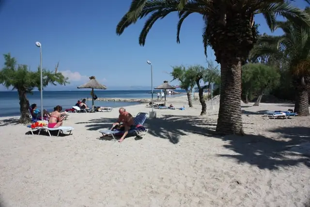 Moraitika Beach in Corfu, featuring a mixed shoreline with calm water conditions