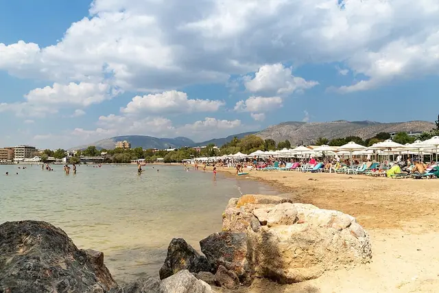 Asteras Beach in Attica, featuring a sandy shoreline with calm water conditions