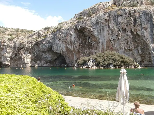 Vouliagmeni Lake beach in Attica with calm water conditions