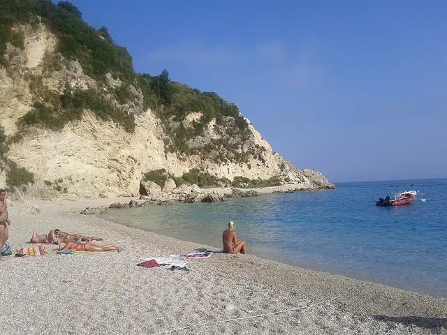 Agios Nikitas Beach in Lefkada, featuring a mixed shoreline with moderate water conditions