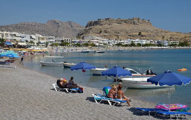 Charaki Beach in Rhodes, featuring a pebbly shoreline with moderate water conditions