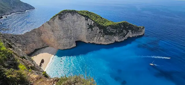 Navagio (Shipwreck beach) beach in Zakynthos, featuring a mixed shoreline with moderate water conditions