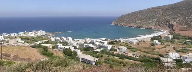 Apollonas Beach in Naxos, featuring a mixed shoreline with moderate water conditions