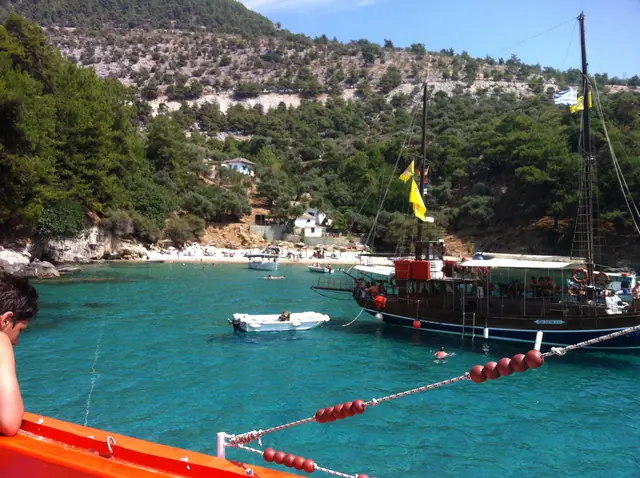 Arsanas beach in Thassos, featuring a pebbly shoreline with moderate water conditions