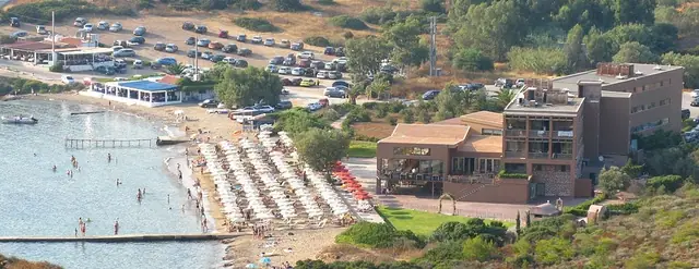 Cape Sounion Beach in Attica, featuring a mixed shoreline with calm water conditions