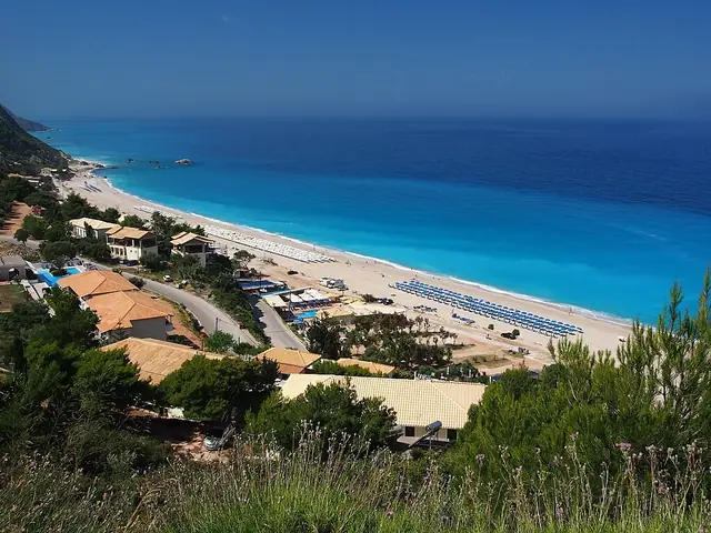 Kathisma Beach in Lefkada, featuring a mixed shoreline with moderate water conditions