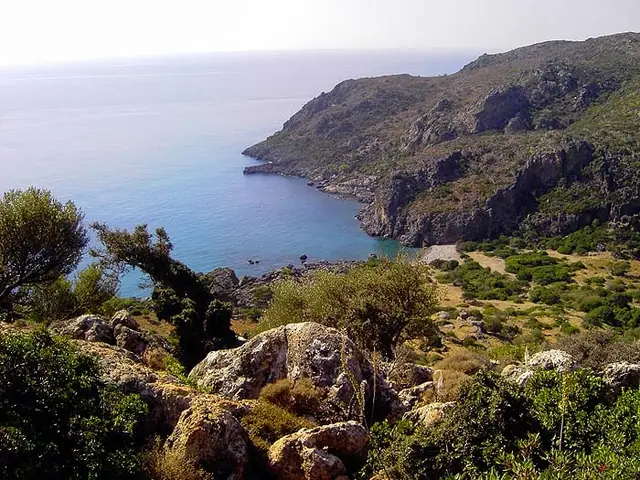 Lissos Beach in Crete, featuring a mixed shoreline with calm water conditions