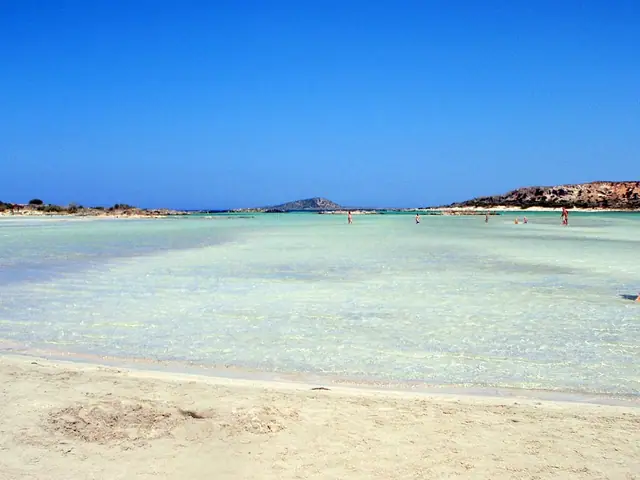 Elafonissi Beach in Crete, featuring a mixed shoreline with calm water conditions