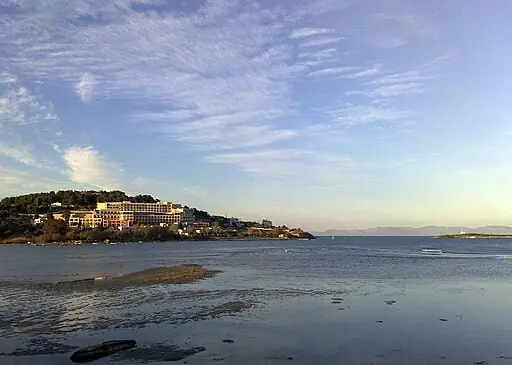Vravrona Beach in Attica, featuring a mixed shoreline with calm water conditions