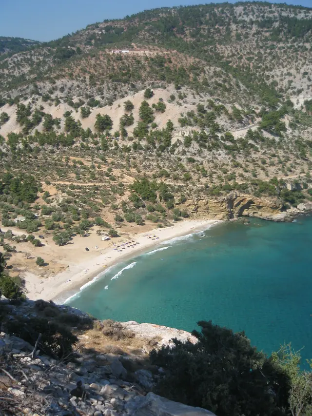 Livadi beach in Thassos, featuring a pebbly shoreline with moderate water conditions