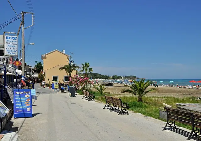 Roda Beach in Corfu, featuring a mixed shoreline with calm water conditions