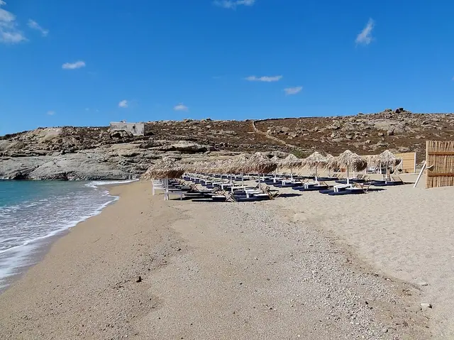 Lia Beach in Mykonos, featuring a sandy shoreline with calm water conditions